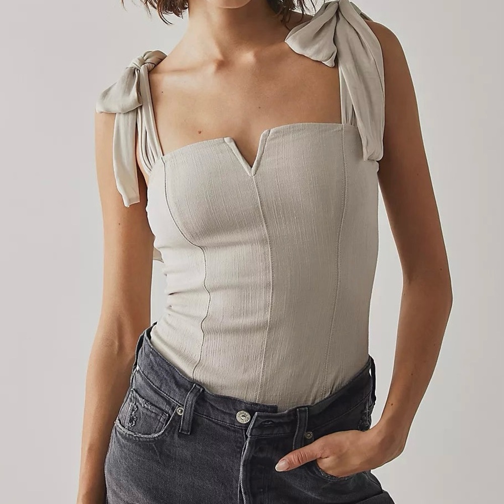 Elegant Cream Bodysuit with Tie Straps